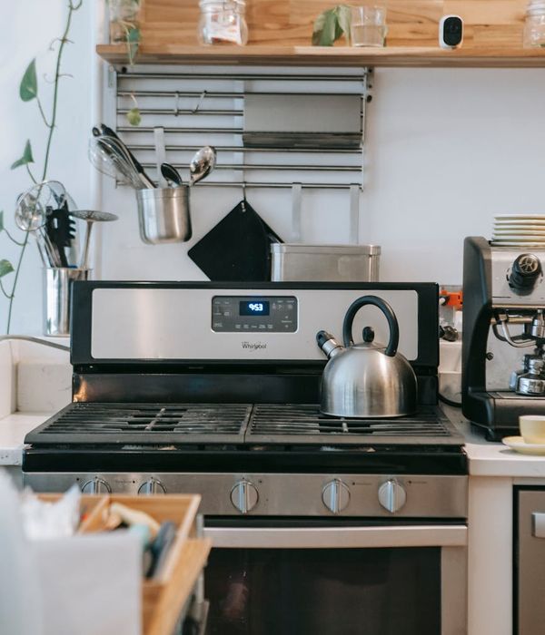 Modern kitchen featuring organized pantry with smart storage solutions
